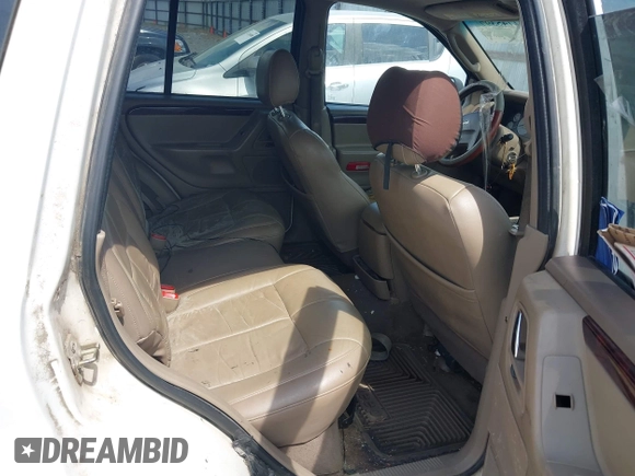 2002 Jeep Grand Cherokee Limited z VIN 1J4GX58N62C195783, wystawiony jako IAAI lot #42745397 z przebiegiem 242 502 mil mil oraz . Historia ofert i sprzedaży dostępna na DreamBid. Obrazek 8.