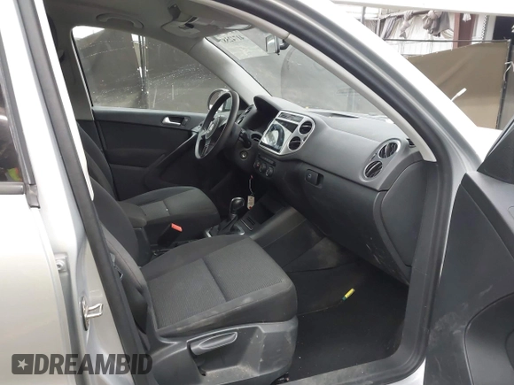 2017 Volkswagen Tiguan S with VIN WVGBV7AX6HK042814, listed as a IAAI auction lot 41742587 with 89,086 mi miles and . Bid and sale history available at DreamBid. Image 5.