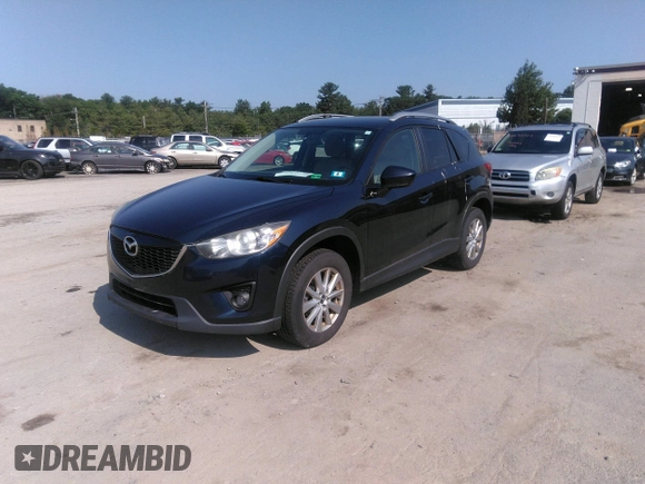 2014 Mazda CX-5 Touring z VIN JM3KE2CYXE0429149, wystawiony jako IAAI lot #42471772 z przebiegiem 222 440 mil mil oraz . Historia ofert i sprzedaży dostępna na DreamBid. Obrazek 17.