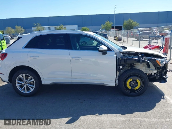 2022 Audi Q3 S line Premium with VIN WA1DECF32N1148121, listed as a IAAI auction lot 42304046 with 19,547 mi miles and . Bid and sale history available at DreamBid. Image 14.