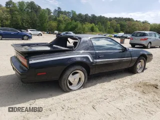 1987 Pontiac Firebird z VIN 1G2FS2184HL222415, wystawiony jako Copart lot #54878805 z przebiegiem 97 287 mil mil oraz Szkody całkowita. Historia ofert i sprzedaży dostępna na DreamBid. Obrazek 3.