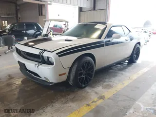 2011 Dodge Challenger with VIN 2B3CJ4DGXBH558348, listed as a IAAI auction lot 41532603 with 127,551 mi miles. Bid and sale history available at carsss.com. Image 2.