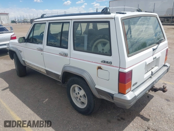 1992 Jeep Cherokee with VIN 1J4FJ58S0NL102716, listed as a IAAI auction lot 42169406 with 197,167 mi miles and . Bid and sale history available at DreamBid. Image 3.
