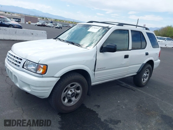 2001 Isuzu Rodeo S with VIN 4S2CK58W614329085, listed as a IAAI auction lot 42303013 with 171,933 mi miles and . Bid and sale history available at DreamBid. Image 6.