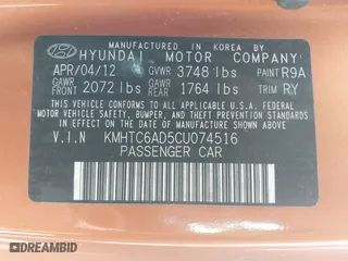 2012 Hyundai Veloster w/Gray Int with VIN KMHTC6AD5CU074516, listed as a IAAI auction lot 42061623 with 133,338 mi miles. Bid and sale history available at carsss.com. Image 9.