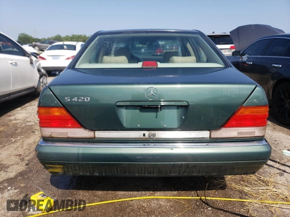 1995 Mercedes-Benz S with VIN WDBGA43E5SA246161, listed as a Copart auction lot 60233354 with 129,774 mi miles and Non Repairable. Bid and sale history available at DreamBid. Image 6.