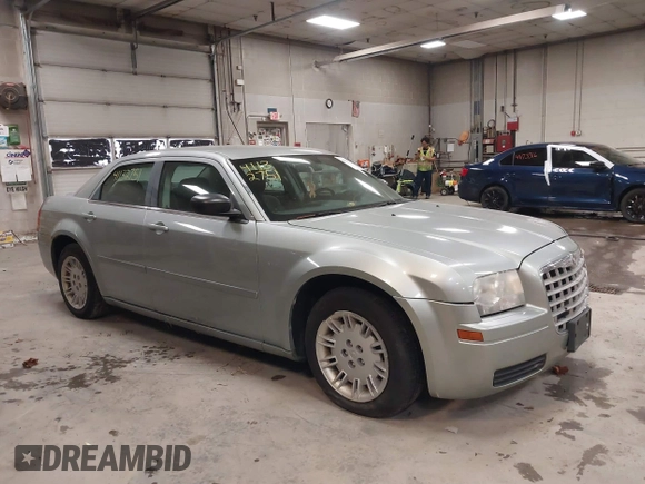 2005 Chrysler 300 with VIN 2C3JA43R55H569369, listed as a IAAI auction lot 41132751 with 123,253 mi miles. Bid and sale history available at carsss.com. Image 14.
