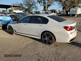 2016 BMW 7 Series 750i xDrive with VIN WBA7B0C59GG526741, listed as a Copart auction lot 86312384 with 90,360 mi miles and Salvage title. Bid and sale history available at DreamBid. Image 2.