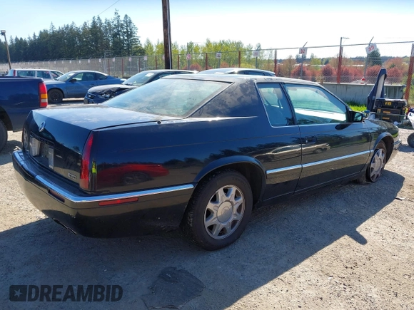 1998 Cadillac Eldorado Touring with VIN 1G6ET1295WU610253, listed as a IAAI auction lot 42066181 with 85,172 mi miles and . Bid and sale history available at DreamBid. Image 4.