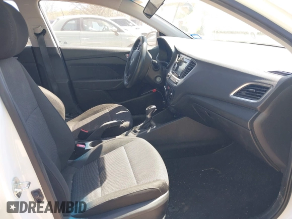 2018 Hyundai Accent SE with VIN 3KPC24A37JE026210, listed as a IAAI auction lot 41753981 with 136,056 mi miles. Bid and sale history available at carsss.com. Image 5.