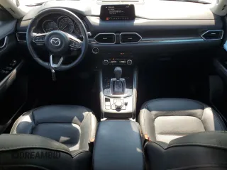 2018 Mazda CX-5 Grand Touring z VIN JM3KFADM5J1420690, wystawiony jako Copart lot #56897875 z przebiegiem 46 483 mil mil oraz Szkoda całkowita • Salvage title. Historia ofert i sprzedaży dostępna na DreamBid. Obrazek 8.