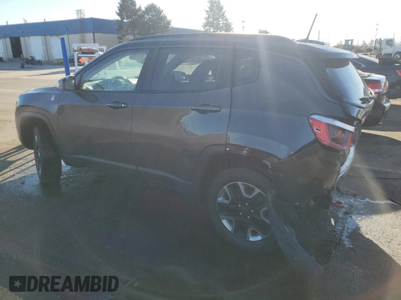 2018 Jeep Compass Trailhawk with VIN 3C4NJDDB4JT192663, listed as a Copart auction lot 79202704 with 73,665 mi miles and Salvage title. Bid and sale history available at DreamBid. Image 2.