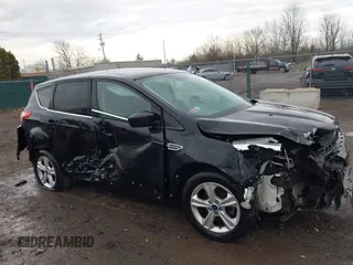 2016 Ford Escape SE with VIN 1FMCU0G78GUB56029, listed as a IAAI auction lot 41904627 with 102,685 mi miles. Bid and sale history available at carsss.com. Image 13.
