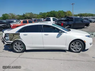 2014 Lincoln MKZ Hybrid with VIN 3LN6L2LU3ER819681, listed as a IAAI auction lot 41867338 with 149,964 mi miles. Bid and sale history available at carsss.com. Image 14.