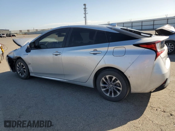 2020 Toyota Prius L Eco z VIN JTDKARFU1L3122471, wystawiony jako Copart lot #54164935 z przebiegiem 130 642 mil mil oraz Szkoda całkowita • Salvage title. Historia ofert i sprzedaży dostępna na DreamBid. Obrazek 2.