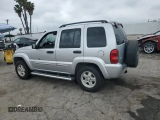 2002 Jeep Liberty Limited with VIN 1J8GK58K52W303098, listed as a Copart auction lot 56005185 with 77,206 mi miles and Clean title. Bid and sale history available at DreamBid. Image 2.