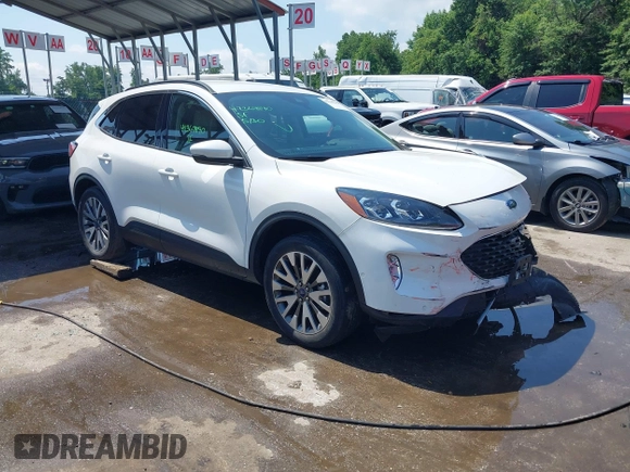 2020 Ford Escape Titanium z VIN 1FMCU9J90LUA39747, wystawiony jako IAAI lot #42369890 z przebiegiem 31 425 mil mil oraz . Historia ofert i sprzedaży dostępna na DreamBid. Obrazek 1.
