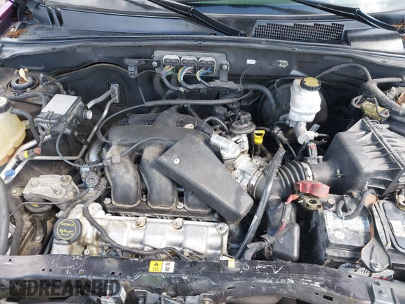 2008 Mercury Mariner Premier with VIN 4M2CU97178KJ00739, listed as a IAAI auction lot 42312408 with 167,591 mi miles and . Bid and sale history available at DreamBid. Image 10.
