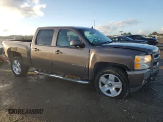 2007 Chevrolet Silverado 1500 Work Truck with VIN 2GCEC13J571550686, listed as a Copart auction lot 86720974 with 141,136 mi miles and Salvage Title. Bid and sale history available at DreamBid. Image 4.