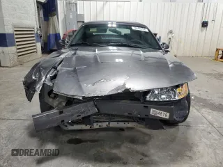 2003 Ford Mustang Deluxe z VIN 1FAFP44433F369534, wystawiony jako Copart lot #76606794 z przebiegiem 88 503 mil mil oraz Szkoda całkowita • Salvage title. Historia ofert i sprzedaży dostępna na DreamBid. Obrazek 5.