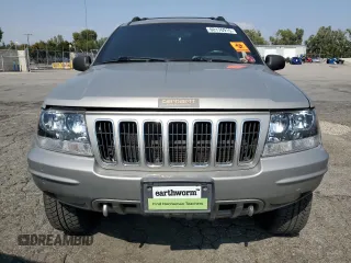 2001 Jeep Grand Cherokee Limited with VIN 1J4GW58N11C721108, listed as a Copart auction lot 60176915 with 257,907 mi miles and Salvage title. Bid and sale history available at DreamBid. Image 5.