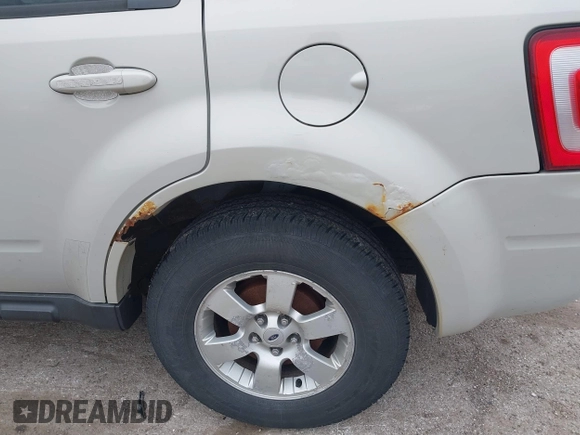 2008 Ford Escape Limited with VIN 1FMCU94108KB33023, listed as a IAAI auction lot 41956715 with 144,421 mi miles. Bid and sale history available at carsss.com. Image 6.