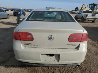 2010 Buick Lucerne CXL Premium with VIN 1G4HJ5EM0AU129841, listed as a Copart auction lot 48680685 with 140,017 mi miles and Salvage Title. Bid and sale history available at DreamBid. Image 6.