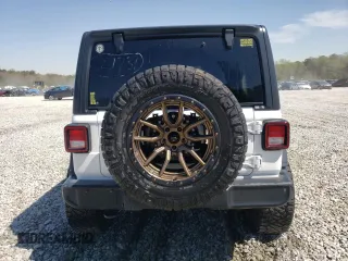 2018 Jeep Wrangler Unlimited Sport with VIN 1C4HJXDN1JW289418, listed as a Copart auction lot 50494925 with 85,408 mi miles and Salvage title. Bid and sale history available at DreamBid. Image 6.