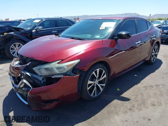 2016 Nissan Maxima SL with VIN 1N4AA6AP0GC426365, listed as a IAAI auction lot 42054030 with 165,557 mi miles and . Bid and sale history available at DreamBid. Image 2.
