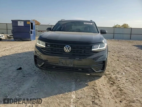 2023 Volkswagen Atlas SEL z VIN 1V2SE2CA0PC220790, wystawiony jako Copart lot #85270934 z przebiegiem 32 394 mil mil oraz Szkoda całkowita • Salvage title. Historia ofert i sprzedaży dostępna na DreamBid. Obrazek 11.