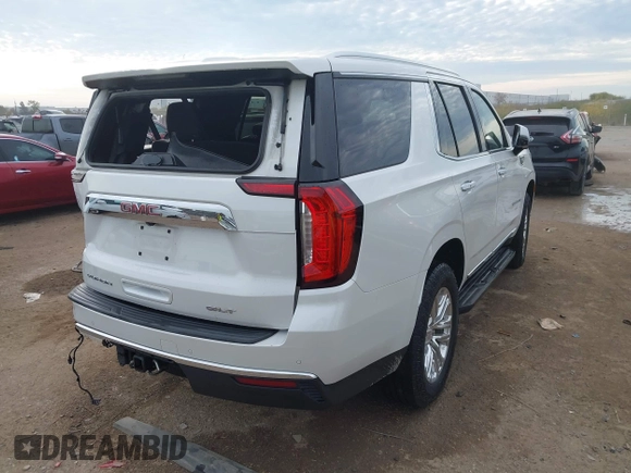 2021 GMC Yukon SLT with VIN 1GKS1BKD1MR489922, listed as a IAAI auction lot 40972652 with 77,791 mi miles. Bid and sale history available at carsss.com. Image 4.