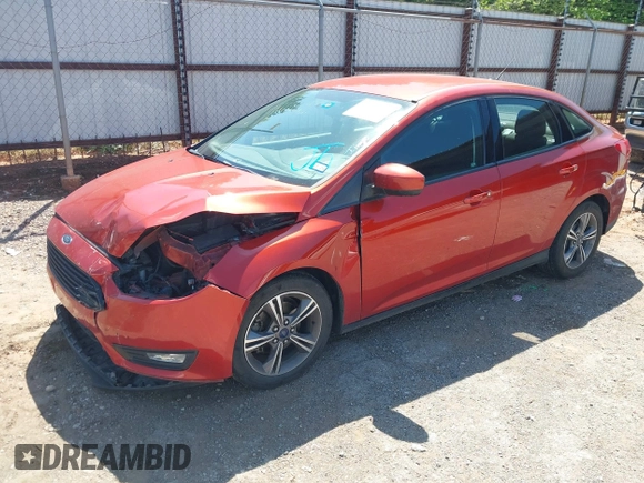 2018 Ford Focus SE z VIN 1FADP3F26JL321831, wystawiony jako IAAI lot #42085951 z przebiegiem 87 729 mil mil oraz . Historia ofert i sprzedaży dostępna na DreamBid. Obrazek 17.