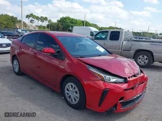2021 Toyota Prius L Eco with VIN JTDKAMFU6M3148195, listed as a IAAI auction lot 41801369 with 130,601 mi miles. Bid and sale history available at carsss.com. Image 1.