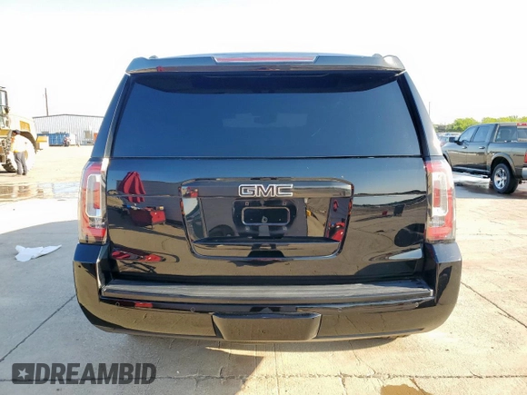 2020 GMC Yukon Denali with VIN 1GKS2CKJ4LR144035, listed as a Copart auction lot 52163455 with 67,944 mi miles and Salvage Title. Bid and sale history available at carsss.com. Image 6.