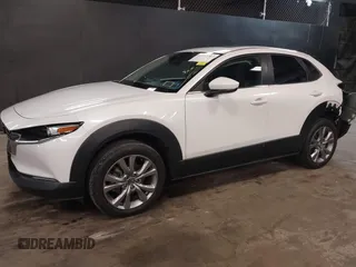 2021 Mazda CX-30 Preferred z VIN 3MVDMBCL2MM210902, wystawiony jako IAAI lot #42522203 z przebiegiem 42 995 mil mil oraz . Historia ofert i sprzedaży dostępna na DreamBid. Obrazek 19.