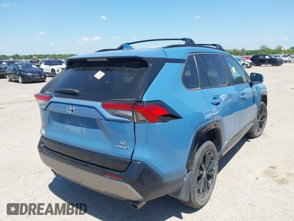2023 Toyota RAV4 Hybrid SE with VIN 4T3T6RFV6PU130213, listed as a IAAI auction lot 42066860 with Not provided miles and . Bid and sale history available at DreamBid. Image 4.