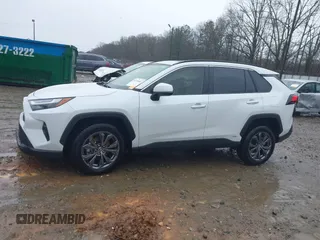 2023 Toyota RAV4 Hybrid XLE Premium with VIN JTMB6RFV4PD114763, listed as a IAAI auction lot 41766812 with 6,768 mi miles. Bid and sale history available at carsss.com. Image 14.