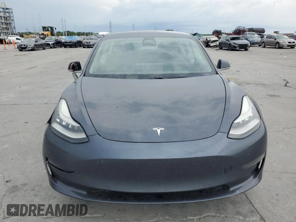 2020 Tesla Model 3 Standard Range Plus z VIN 5YJ3E1EA1LF784832, wystawiony jako Copart lot #57912995 z przebiegiem 77 665 mil mil oraz Szkoda całkowita • Salvage title. Historia ofert i sprzedaży dostępna na DreamBid. Obrazek 5.