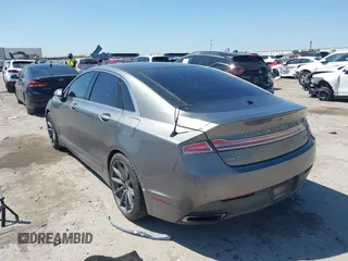 2014 Lincoln MKZ z VIN 3LN6L2G92ER835456, wystawiony jako IAAI lot #41985573 z przebiegiem 174 080 mil mil oraz . Historia ofert i sprzedaży dostępna na DreamBid. Obrazek 3.