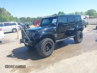 2017 Jeep Wrangler Unlimited Sahara with VIN 1C4BJWEG4HL637482, listed as a IAAI auction lot 41951349 with 76,030 mi miles. Bid and sale history available at carsss.com. Image 2.