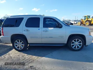 2013 GMC Yukon Denali with VIN 1GKS1EEF0DR121701, listed as a IAAI auction lot 41814818 with 137,177 mi miles. Bid and sale history available at carsss.com. Image 13.