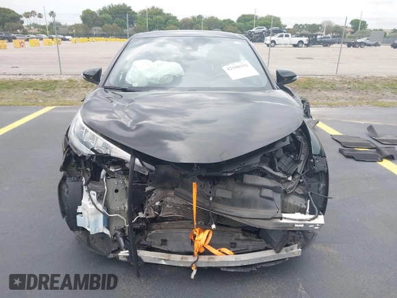 2021 Toyota C-HR LE z VIN NMTKHMBX3MR127202, wystawiony jako IAAI lot #42188312 z przebiegiem 54 029 mil mil oraz . Historia ofert i sprzedaży dostępna na DreamBid. Obrazek 13.