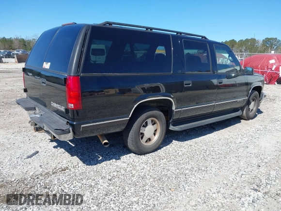 1999 Chevrolet Suburban with VIN 3GNEC16R0XG137834, listed as a IAAI auction lot 41853492 with 296,147 mi miles and . Bid and sale history available at DreamBid. Image 4.