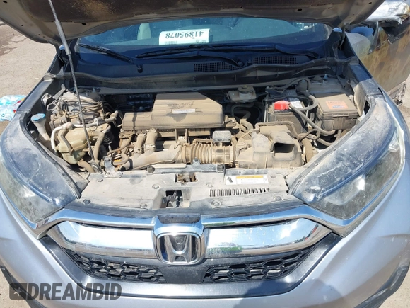2018 Honda CR-V EX with VIN 7FARW2H59JE059539, listed as a IAAI auction lot 41895078 with 132,631 mi miles and . Bid and sale history available at DreamBid. Image 10.