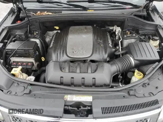 2013 Jeep Grand Cherokee Overland with VIN 1C4RJFCTXDC555233, listed as a Copart auction lot 44535045 with 104,721 mi miles and Clean Title. Bid and sale history available at carsss.com. Image 12.