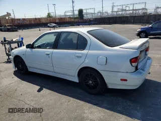 2002 Infiniti G20 Luxury z VIN JNKCP11A52T509667, wystawiony jako Copart lot #72986584 z przebiegiem 119 458 mil mil oraz Szkody całkowita. Historia ofert i sprzedaży dostępna na DreamBid. Obrazek 2.