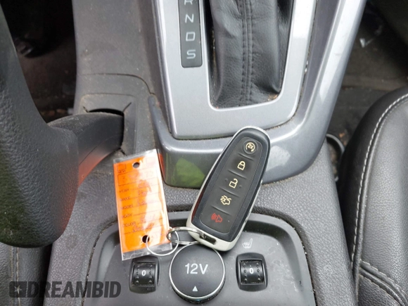 2014 Ford Focus Titanium with VIN 1FADP3J28EL240911, listed as a IAAI auction lot 42082812 with 144,625 mi miles. Bid and sale history available at carsss.com. Image 11.