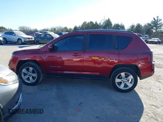 2016 Jeep Compass Latitude with VIN 1C4NJDEB1GD662807, listed as a IAAI auction lot 41161996 with 128,030 mi miles. Bid and sale history available at carsss.com. Image 13.