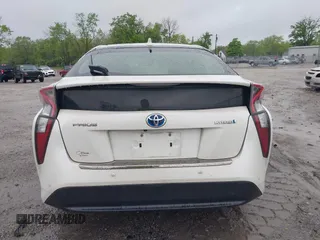 2018 Toyota Prius Two with VIN JTDKARFU9J3054742, listed as a IAAI auction lot 41641032 with 209,986 mi miles and . Bid and sale history available at DreamBid. Image 16.