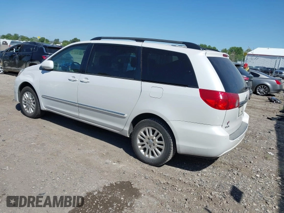 2008 Toyota Sienna XLE with VIN 5TDBK22CX8S013241, listed as a IAAI auction lot 42609126 with 201,919 mi miles and . Bid and sale history available at DreamBid. Image 3.